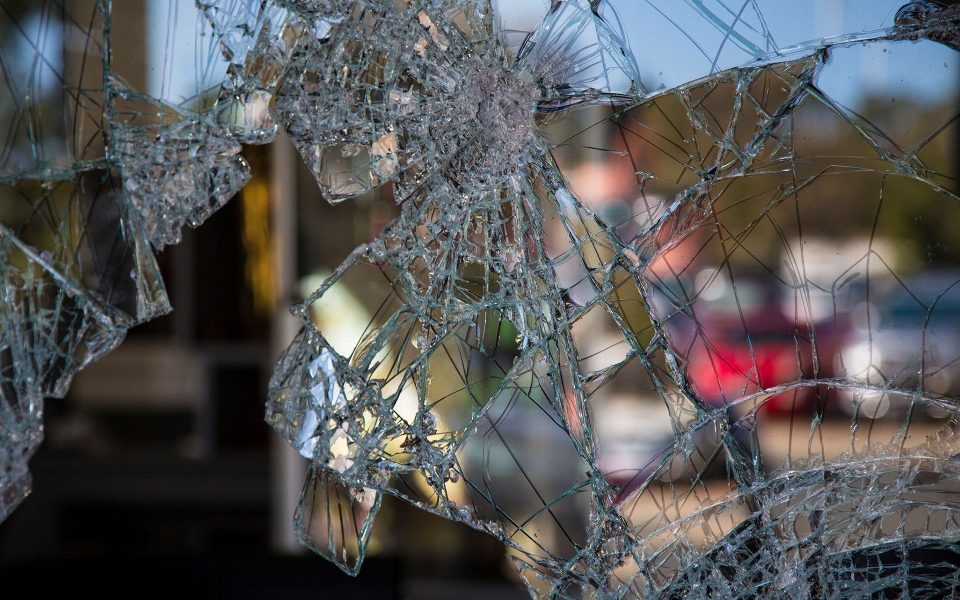 Shattered commercial glass, S.O.S. Door and Glass Services homepage photo